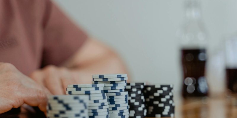Poker chips neatly stacked on a table, ready for play.